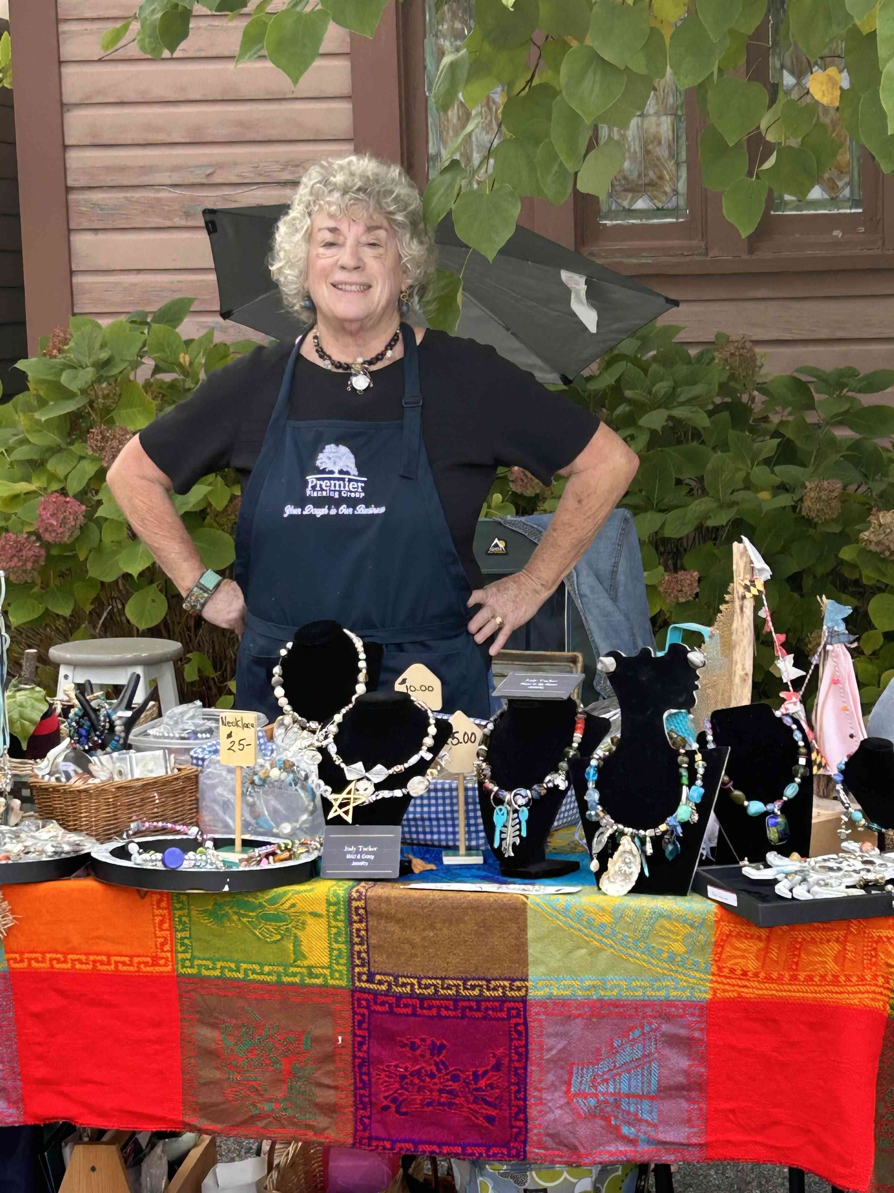 Person selling items at a craft fair